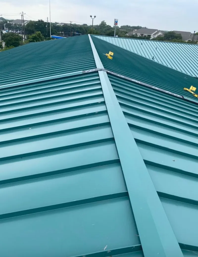 Green commercial metal roof ridge and valley for Metal Roof Repair in Raisinville